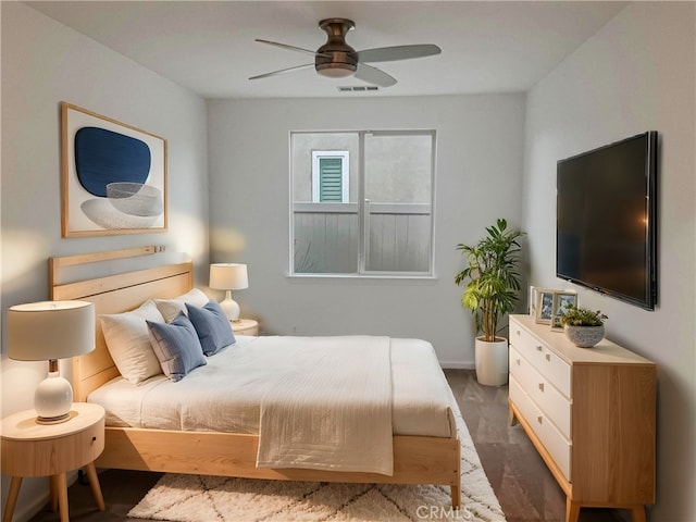 bedroom with a ceiling fan and visible vents