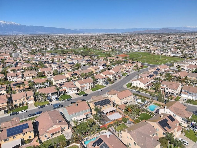 drone / aerial view featuring a mountain view and a residential view