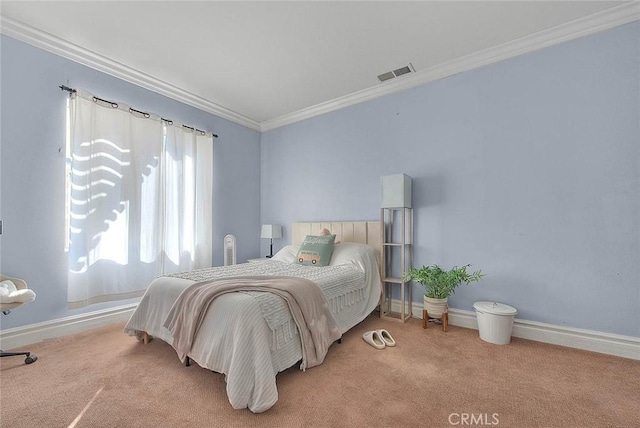 bedroom with carpet flooring, baseboards, visible vents, and ornamental molding