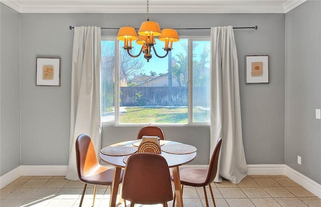 dining space with light tile patterned floors, a notable chandelier, crown molding, and baseboards