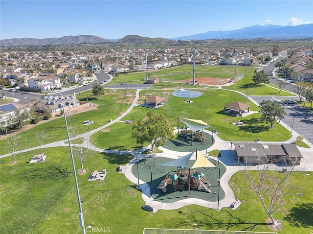 drone / aerial view featuring a mountain view and a residential view