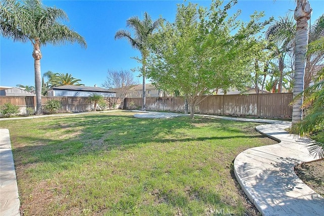 view of yard featuring a fenced backyard