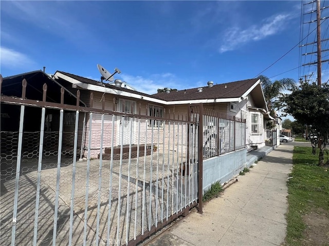 view of property exterior featuring fence