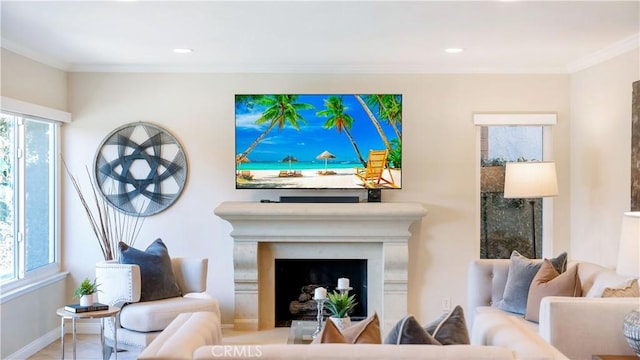 living room featuring recessed lighting, a fireplace, baseboards, and ornamental molding