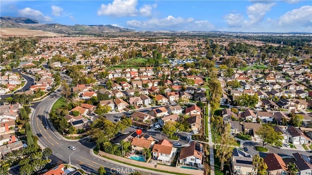 aerial view featuring a residential view and a mountain view