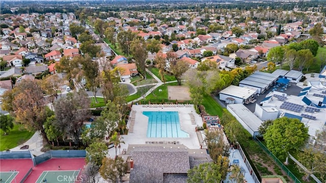 birds eye view of property with a residential view