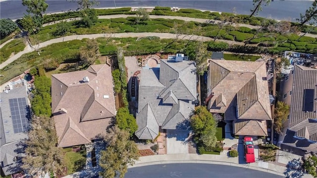 birds eye view of property with a residential view