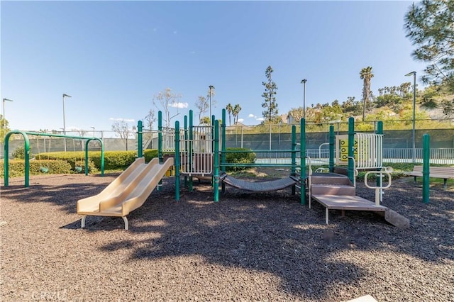 community playground featuring fence