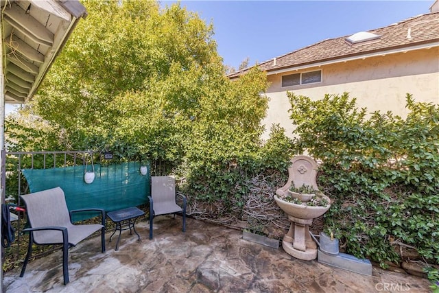 view of patio with fence