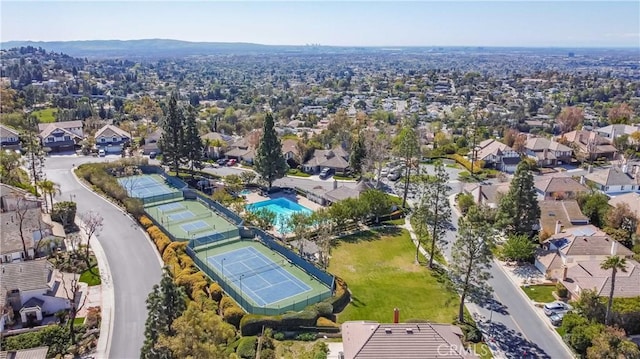 birds eye view of property with a residential view