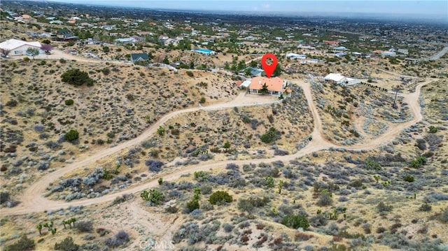 drone / aerial view with a rural view and a desert view