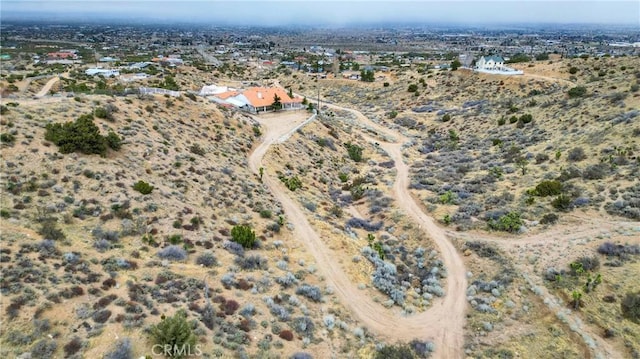 aerial view with a desert view and a rural view