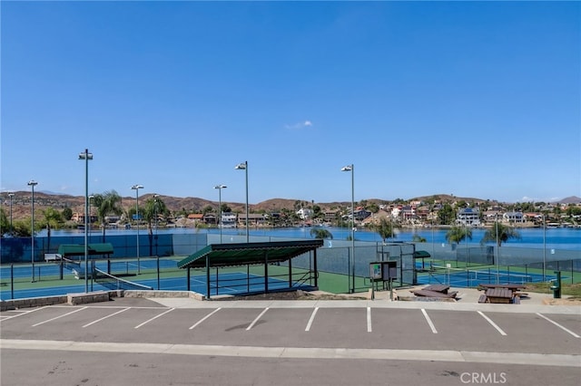 22176 Dogie Pl, Canyon Lake, CA 92587 - view of tennis court with a mountain view