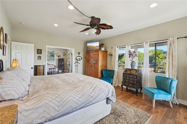 22176 Dogie Pl, Canyon Lake, CA 92587 - bedroom with recessed lighting, wood finished floors, and ceiling fan