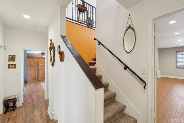 22176 Dogie Pl, Canyon Lake, CA 92587 - stairway featuring wood finished floors and recessed lighting