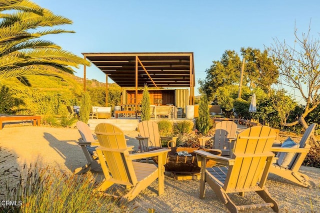 view of patio / terrace with a fire pit