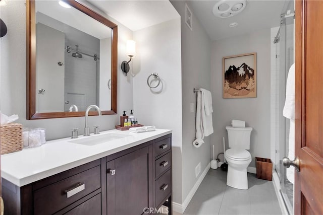 full bathroom with vanity, baseboards, a shower, tile patterned floors, and toilet