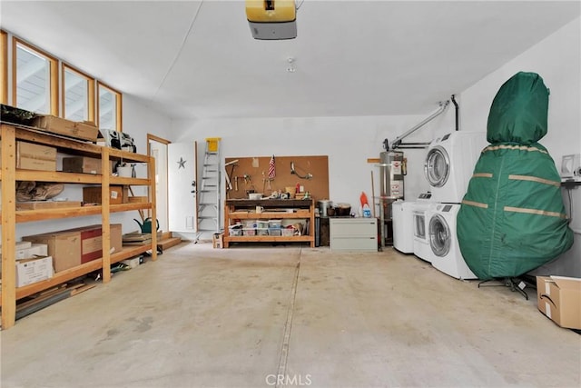 interior space featuring strapped water heater, a garage door opener, and stacked washer / dryer