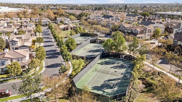 birds eye view of property with a residential view