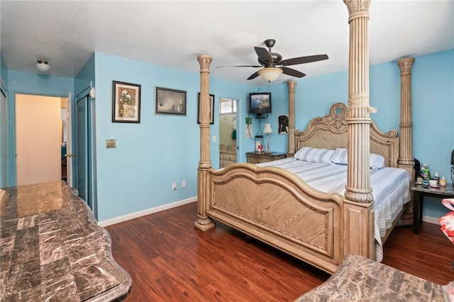 bedroom featuring ceiling fan, baseboards, and dark wood finished floors