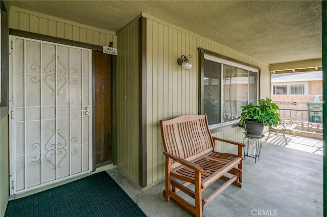 entrance to property with covered porch