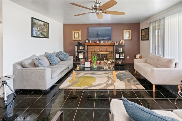 tiled living room with a brick fireplace and a ceiling fan