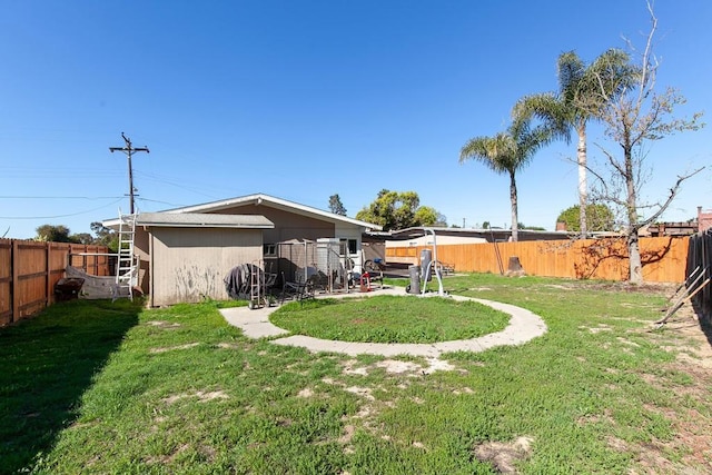 exterior space with a fenced backyard