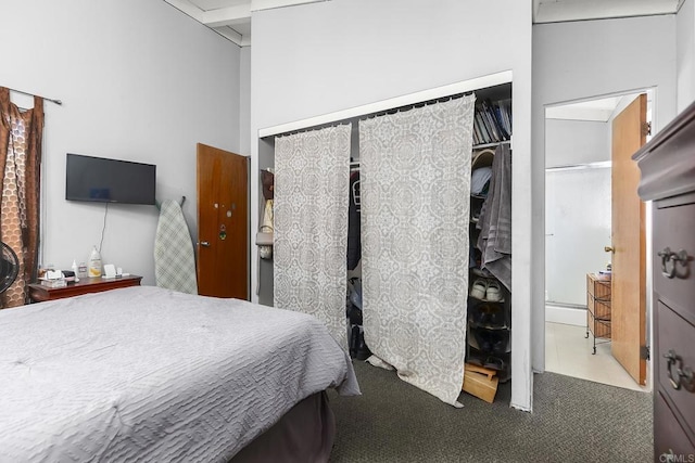 carpeted bedroom featuring a high ceiling