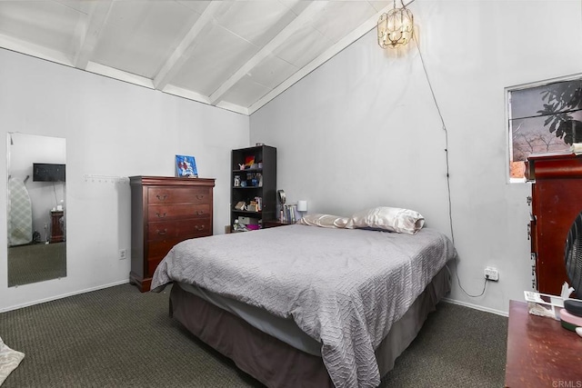 bedroom featuring lofted ceiling with beams, baseboards, and carpet floors