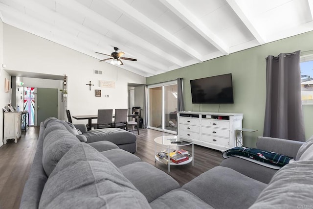 living area with lofted ceiling with beams, visible vents, wood finished floors, and ceiling fan