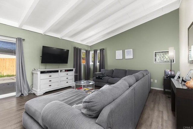 living area featuring lofted ceiling with beams, wood finished floors, and baseboards