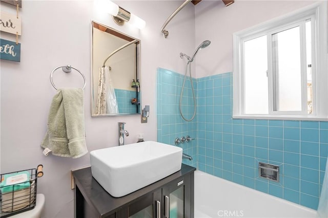 full bathroom with shower / bathtub combination with curtain, toilet, and vanity