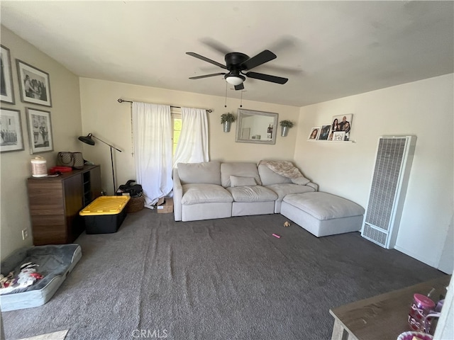 carpeted living area with visible vents and a ceiling fan