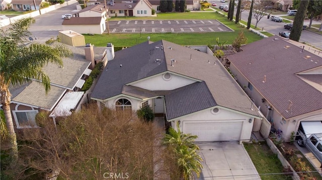 drone / aerial view with a residential view