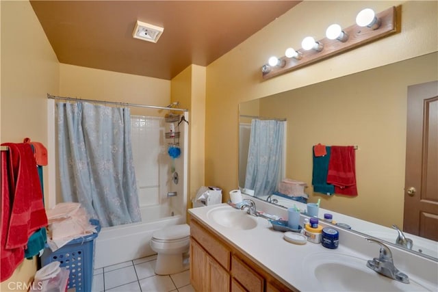 bathroom featuring tile patterned flooring, toilet, shower / tub combo with curtain, double vanity, and a sink