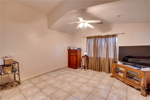 interior space featuring visible vents, ceiling fan, and vaulted ceiling