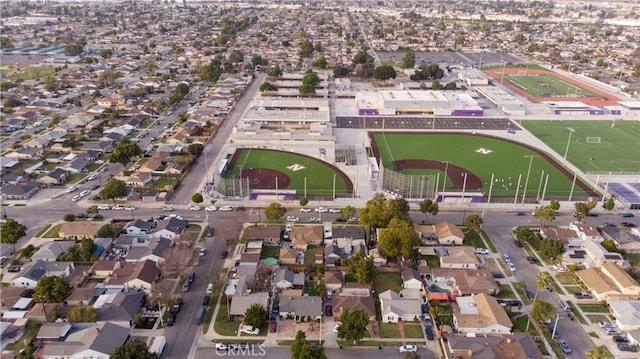 birds eye view of property with a residential view