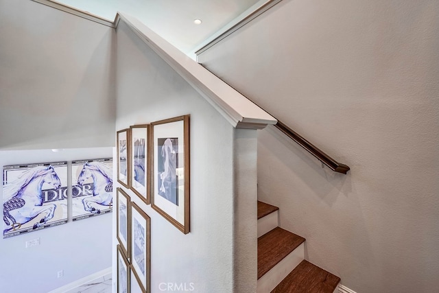 staircase with marble finish floor