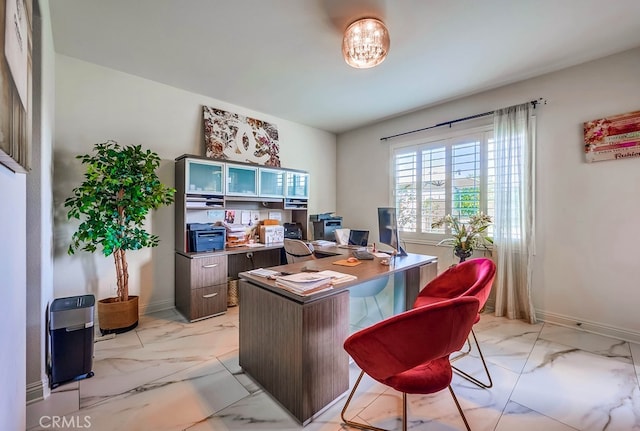 home office featuring marble finish floor and baseboards