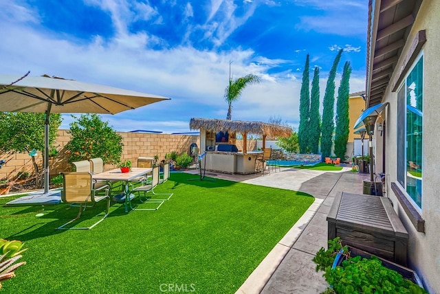 view of yard with a patio area, a fenced in pool, and a fenced backyard