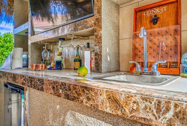 bar with indoor bar and a sink