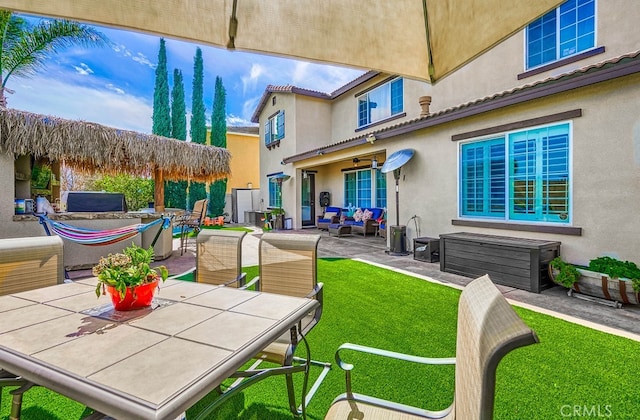 view of patio featuring outdoor dining space