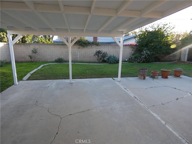 view of patio / terrace featuring fence