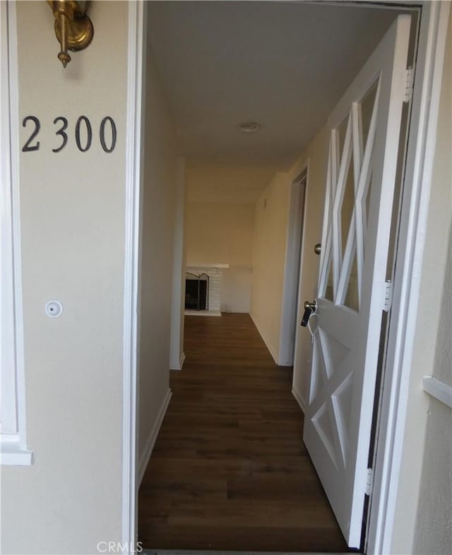 hallway with dark wood-style floors