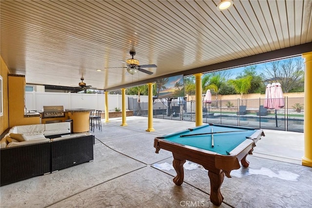 view of patio / terrace featuring a pool, grilling area, an outdoor hangout area, a fenced backyard, and a ceiling fan