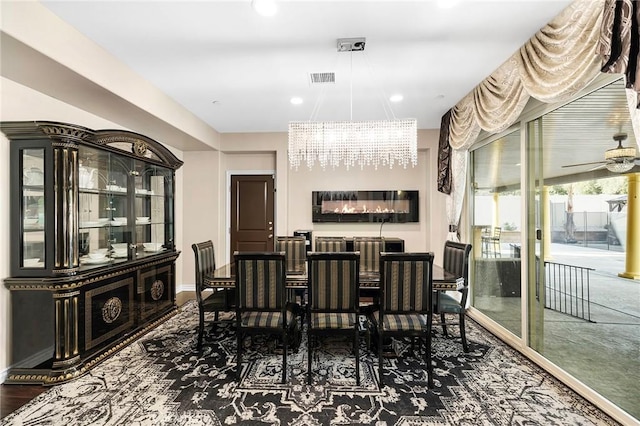 dining room featuring visible vents, a ceiling fan, wood finished floors, recessed lighting, and baseboards