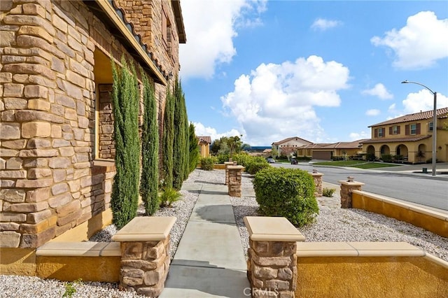 view of yard with a residential view