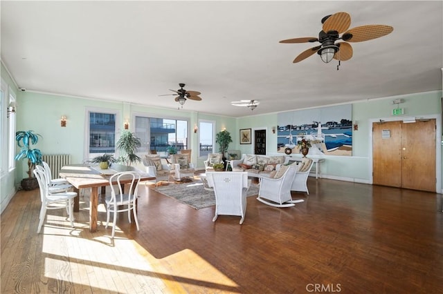 sunroom / solarium featuring ceiling fan