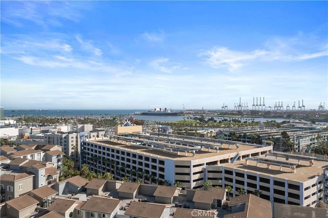 bird's eye view featuring a water view and a view of city