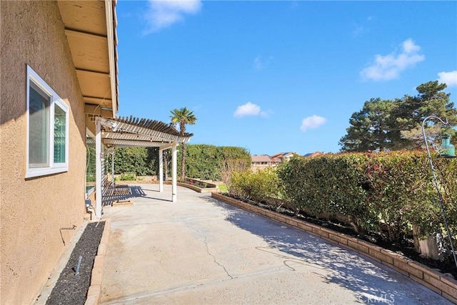12899 Rain Shadow Rd, Victorville, CA 92395 - view of patio featuring a pergola